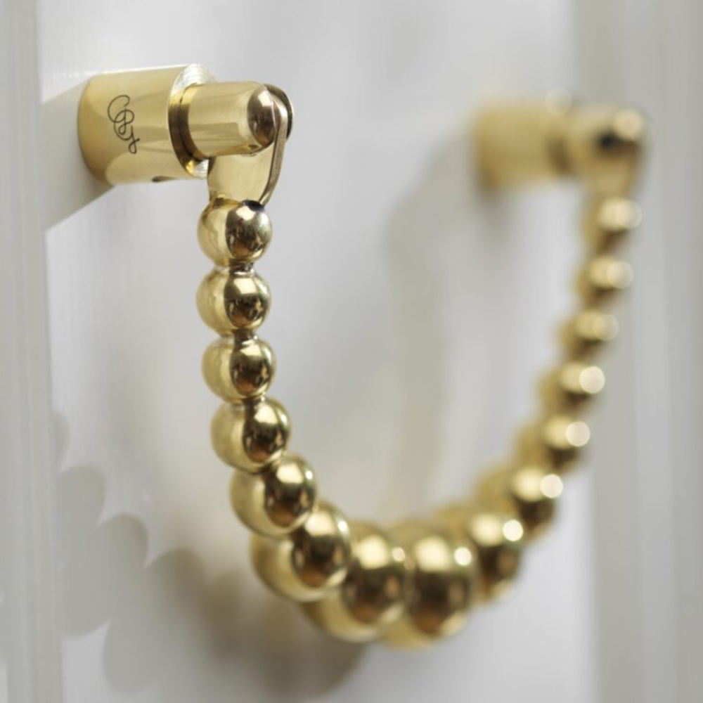 Load image into Gallery viewer, GARDEN GLORY Pearl Ribbon Door Knocker - Polished Brass **Limited Stock**