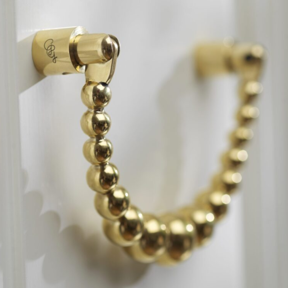 Load image into Gallery viewer, GARDEN GLORY Pearl Ribbon Door Knocker - Polished Brass