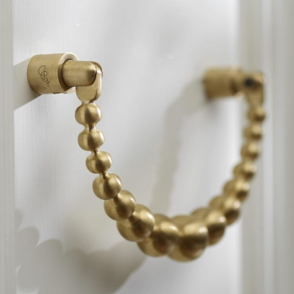 Load image into Gallery viewer, GARDEN GLORY Pearl Ribbon Door Knocker - Brushed Brass