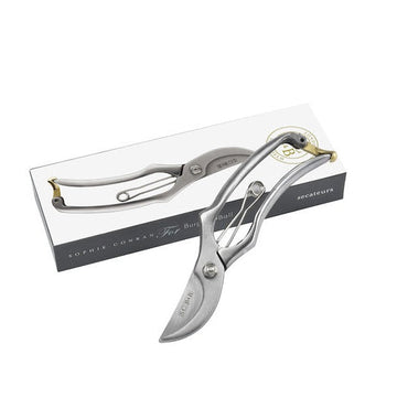 Metal garden pruner with packaging on a white background
