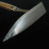 Metal spatula with wooden handle on a black background