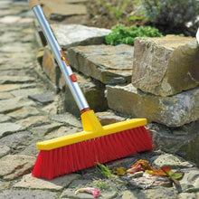 Load image into Gallery viewer, WOLF GARTEN | Multi-change 40cm Street Broom in use outdoors