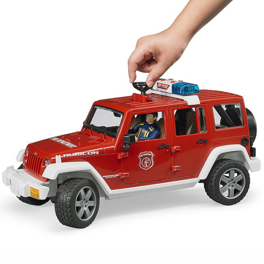 Load image into Gallery viewer, BRUDER Jeep Wrangler Rubicon Fire Dept with Fireman 1:16