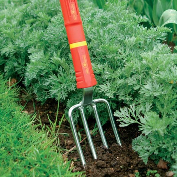 Load image into Gallery viewer, WOLF GARTEN Multi-change Flower Fork in the garden