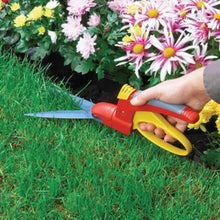 Load image into Gallery viewer, Adjustable WOLF GARTEN Comfort Hand Lawn and Garden Shears in use
