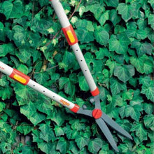 Load image into Gallery viewer, WOLF GARTEN | Telescopic Hedge Shears on the hedge