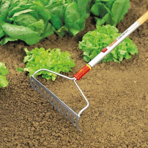 WOLF GARTEN Multi-change Bow Holder Rake in the garden